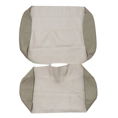 Undersides of two tan upholstery skins laid flat, showing unfinished edges