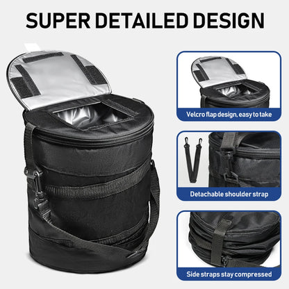 Black cylindrical cooler bag with open insulated lid, shoulder strap and compression-strap details
