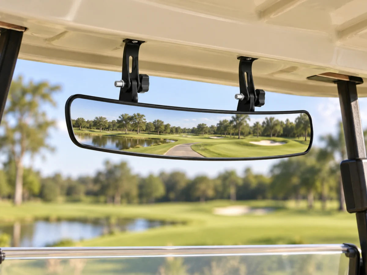 Wide panoramic rear-view mirror installed beneath a golf cart roof