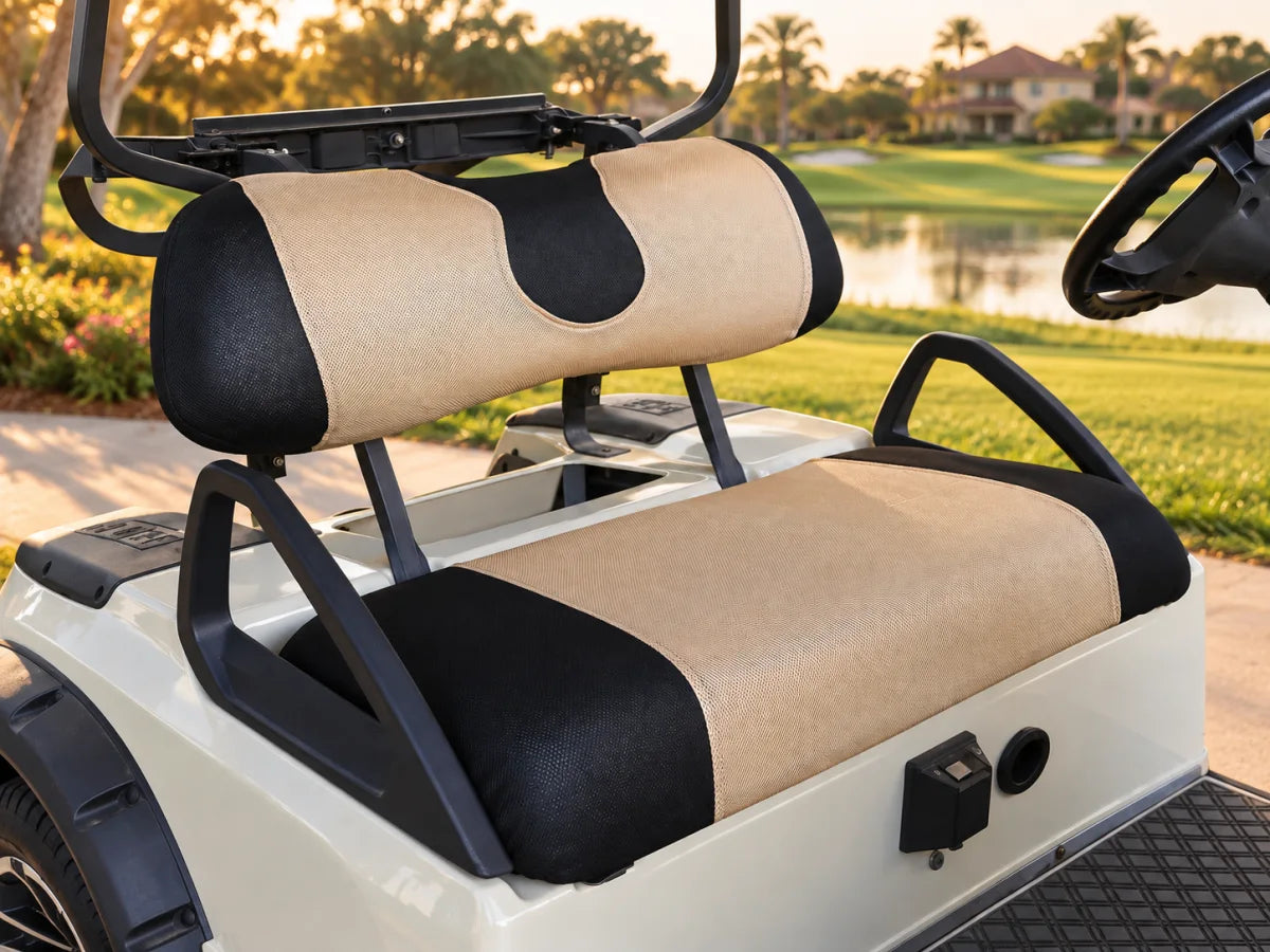 Beige and black breathable golf cart seat covers installed at a golf course